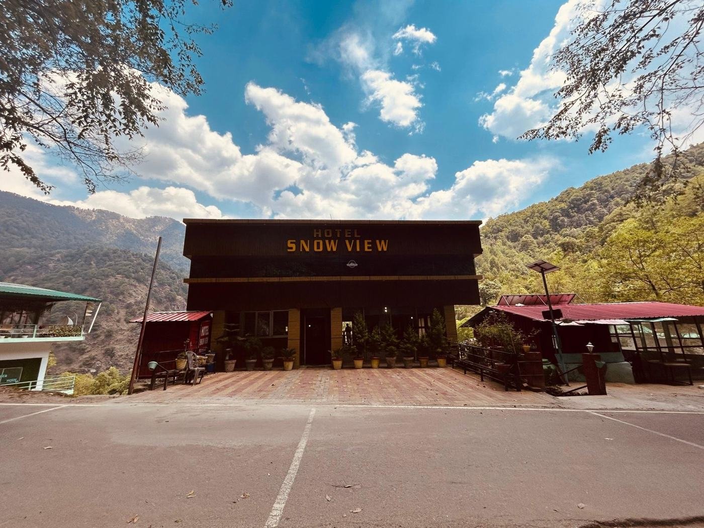 Hotel front with forest behind
