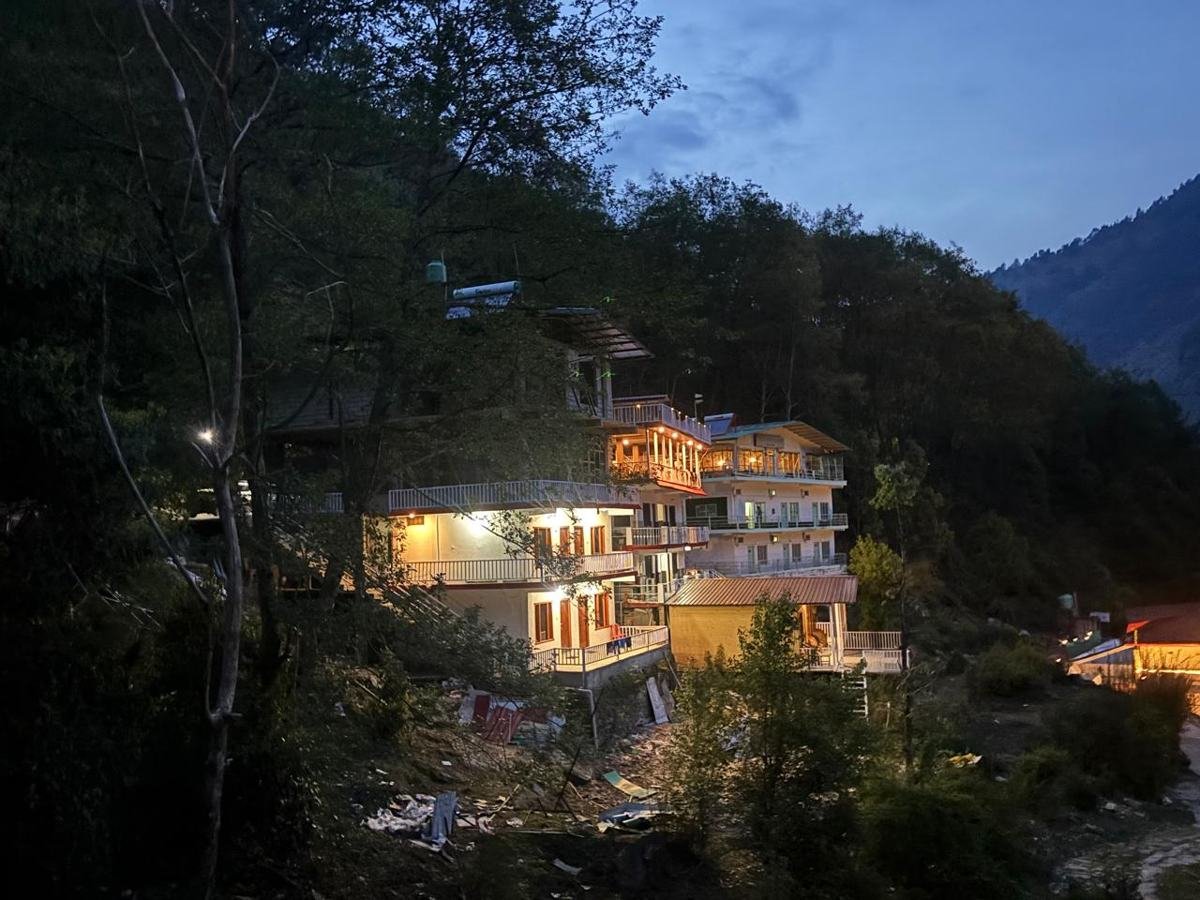 The hotel on the hillside at dusk
