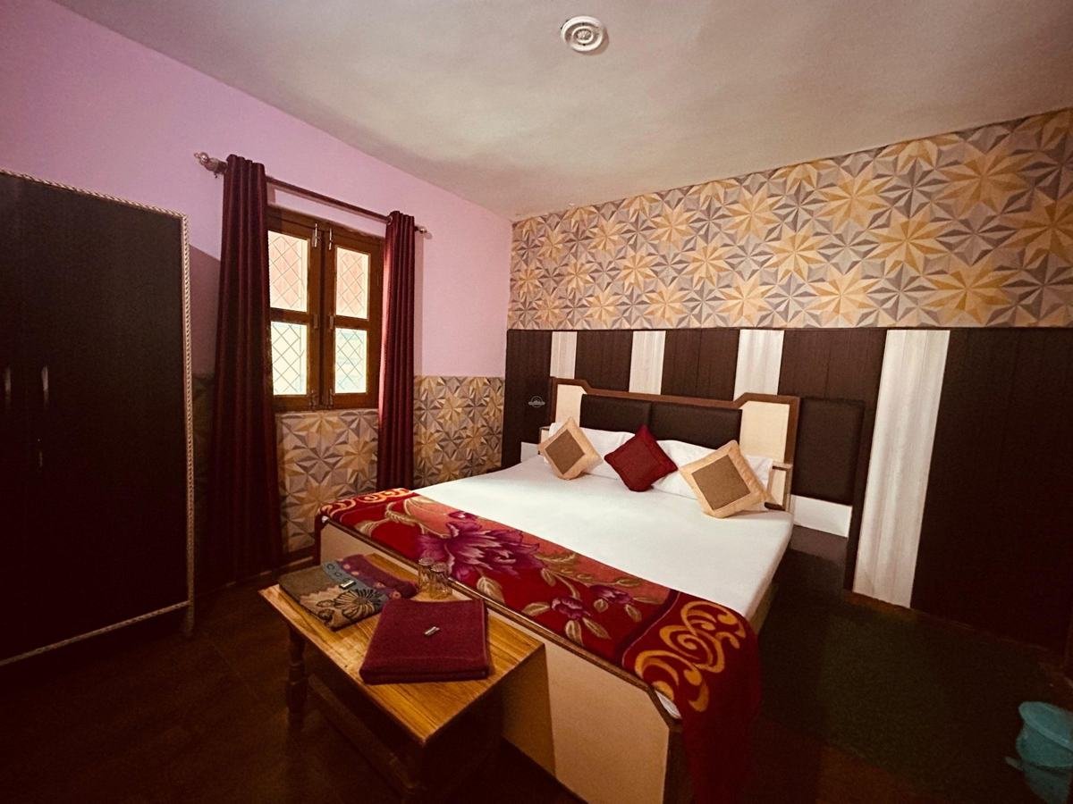 Room with patterned wallpaper